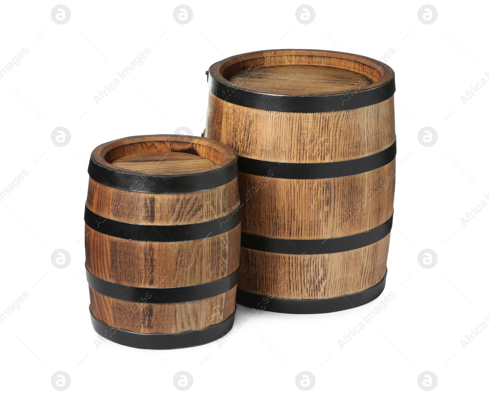 Photo of Two traditional wooden barrels isolated on white