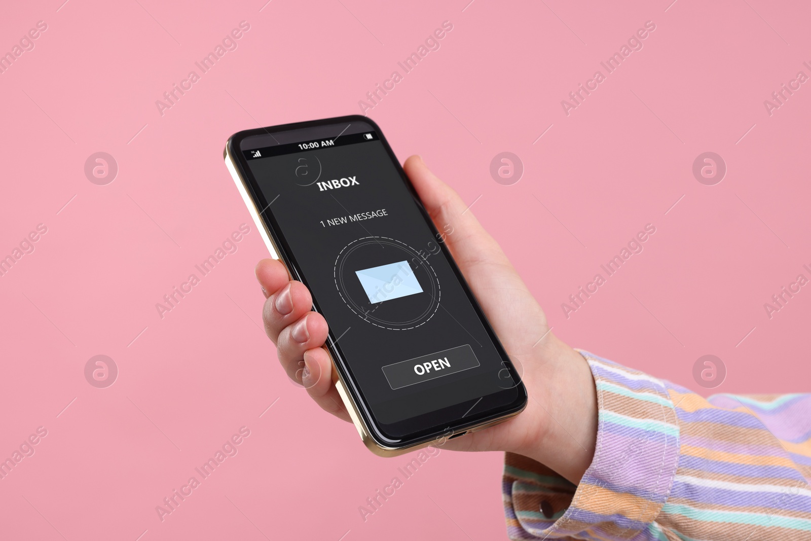 Image of Got new message. Woman holding smartphone on pink background, closeup