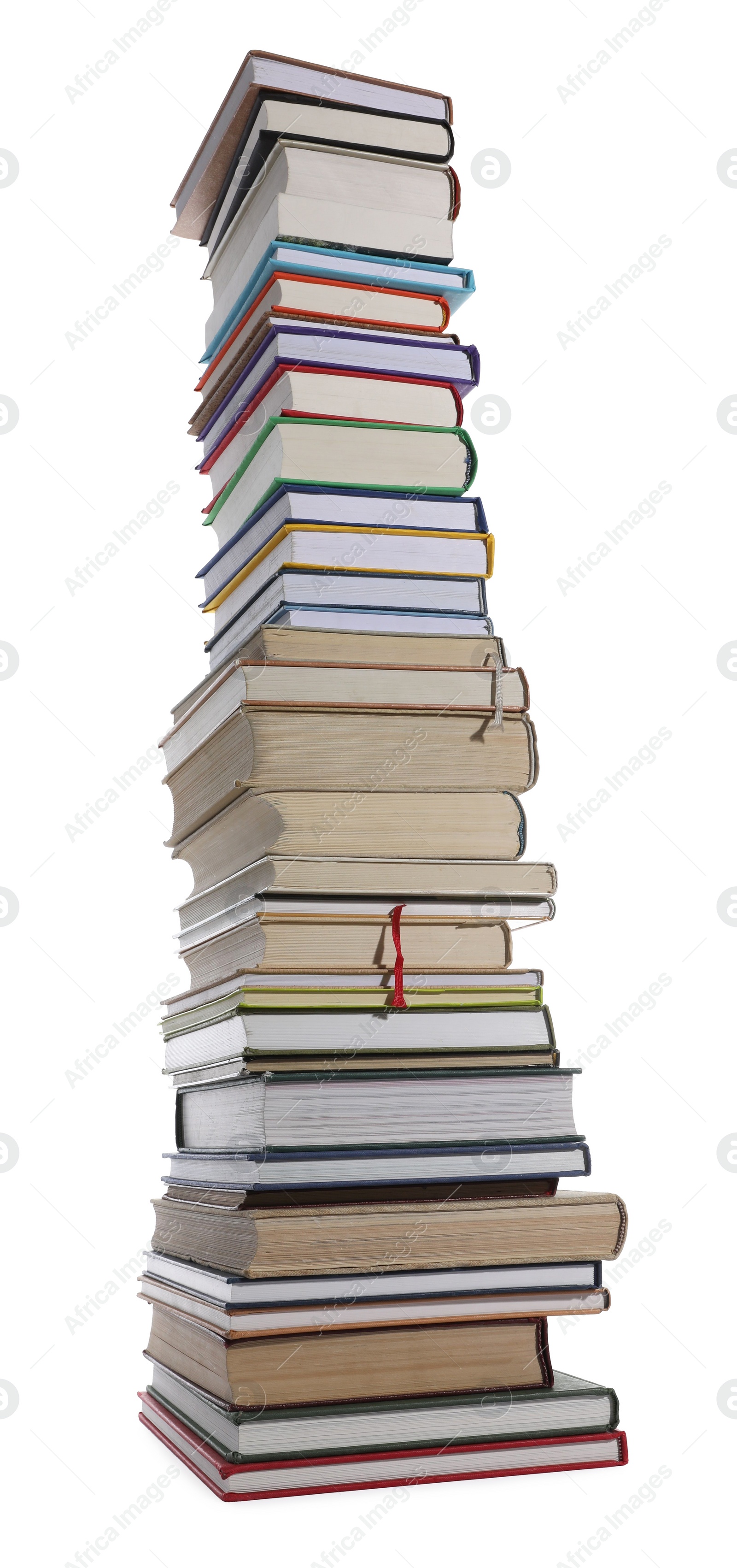 Photo of High stack of many different books isolated on white