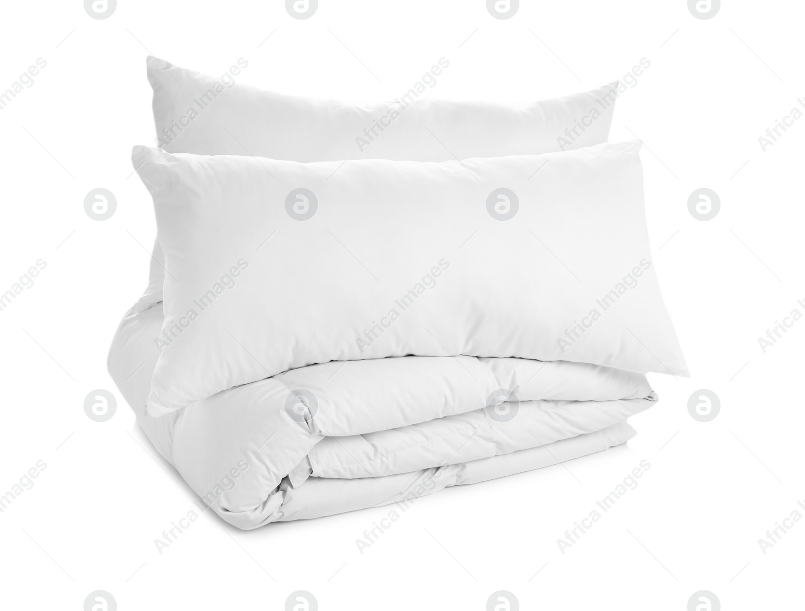 Photo of Soft blanket and pillows on white background