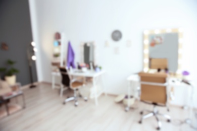Photo of Blurred view of hairdressing salon