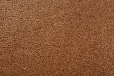 Photo of Light brown leather as background, top view