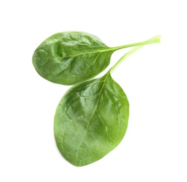 Fresh green healthy baby spinach leaves isolated on white, top view