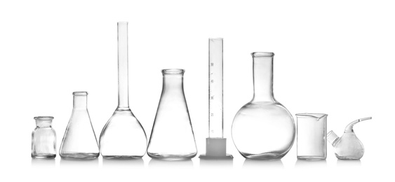 Photo of Laboratory glassware isolated on white. Chemical analysis