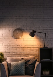 Photo of Interior of living room with modern lamps