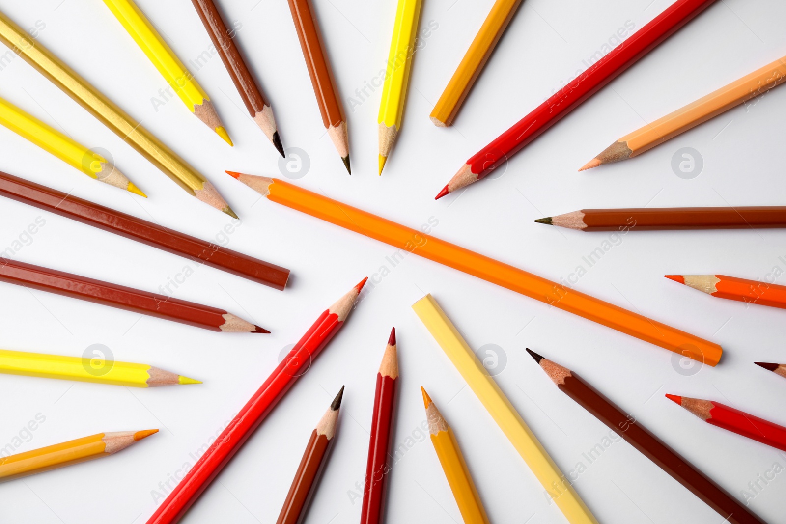 Photo of Composition with color pencils on white background, top view