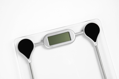 Photo of Modern scales isolated on white. Diet and weight loss