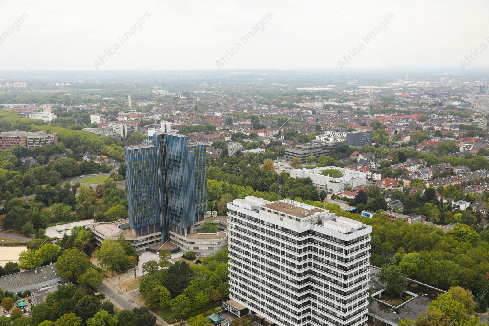 Photo of View of beautiful city with buildings and trees