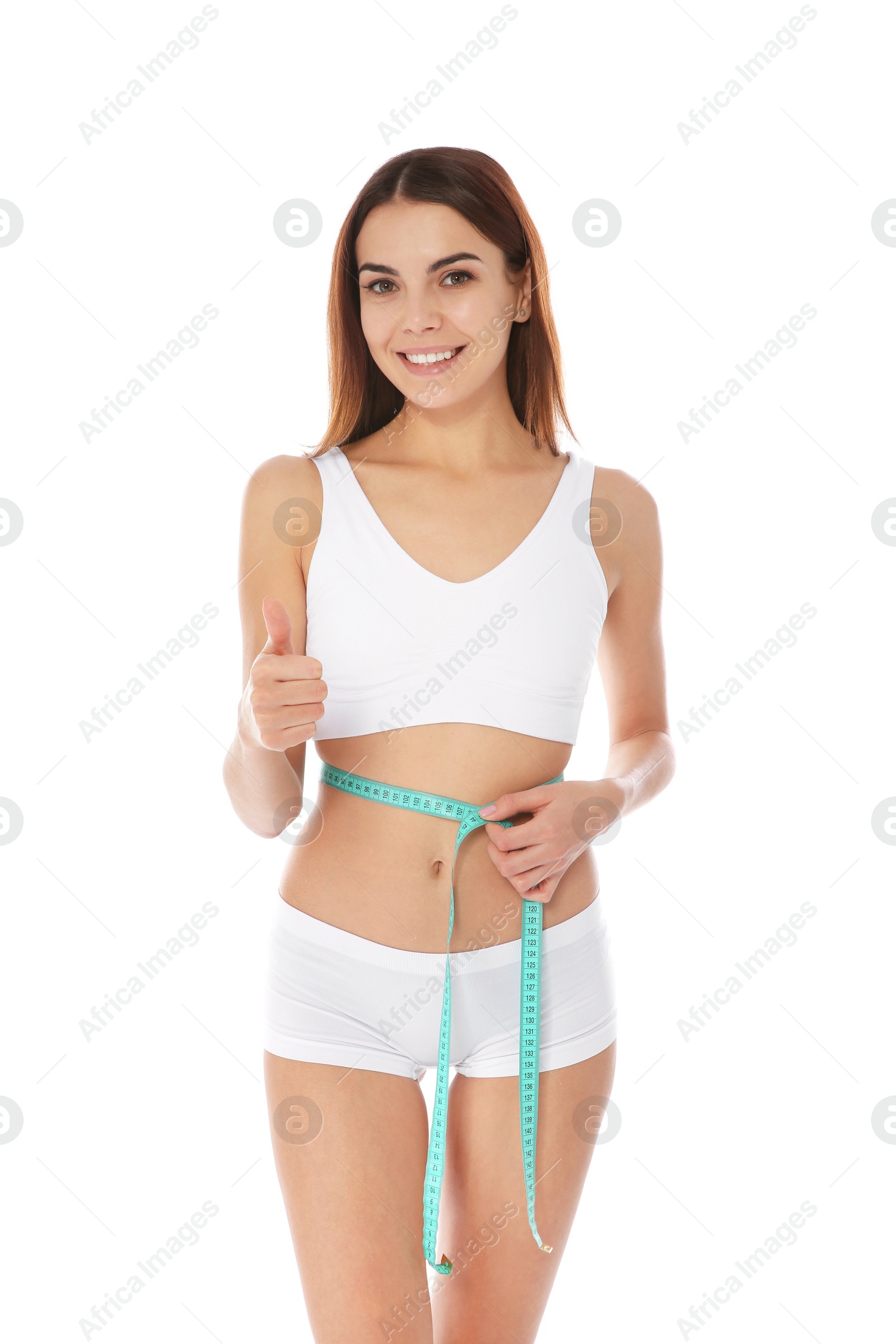 Photo of Slim woman measuring her waist on white background. Weight loss