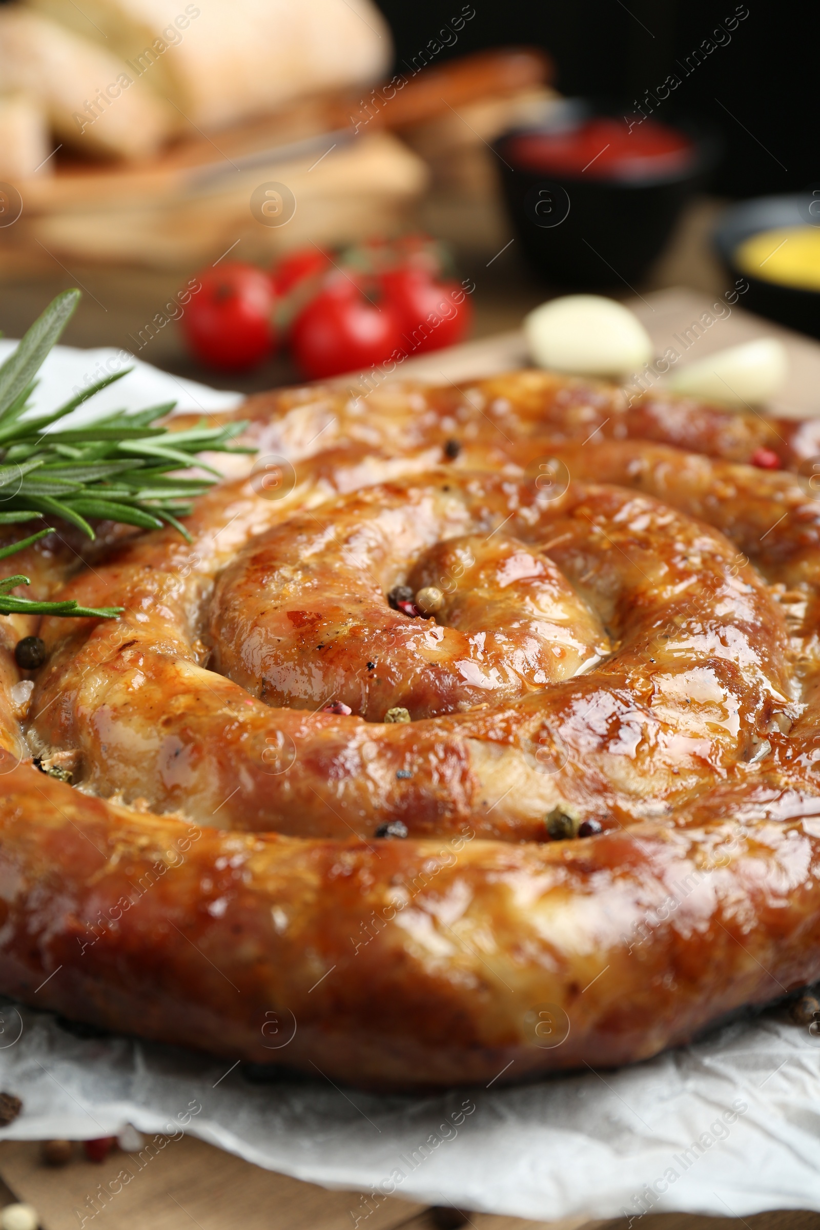 Photo of Delicious homemade sausage with spices on table, closeup