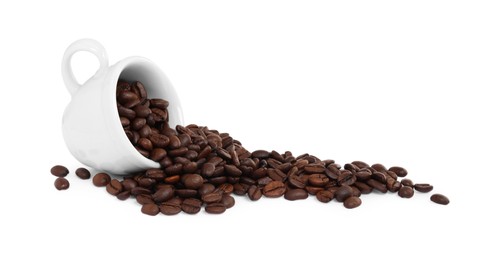 Photo of Coffee beans and overturned cup isolated on white