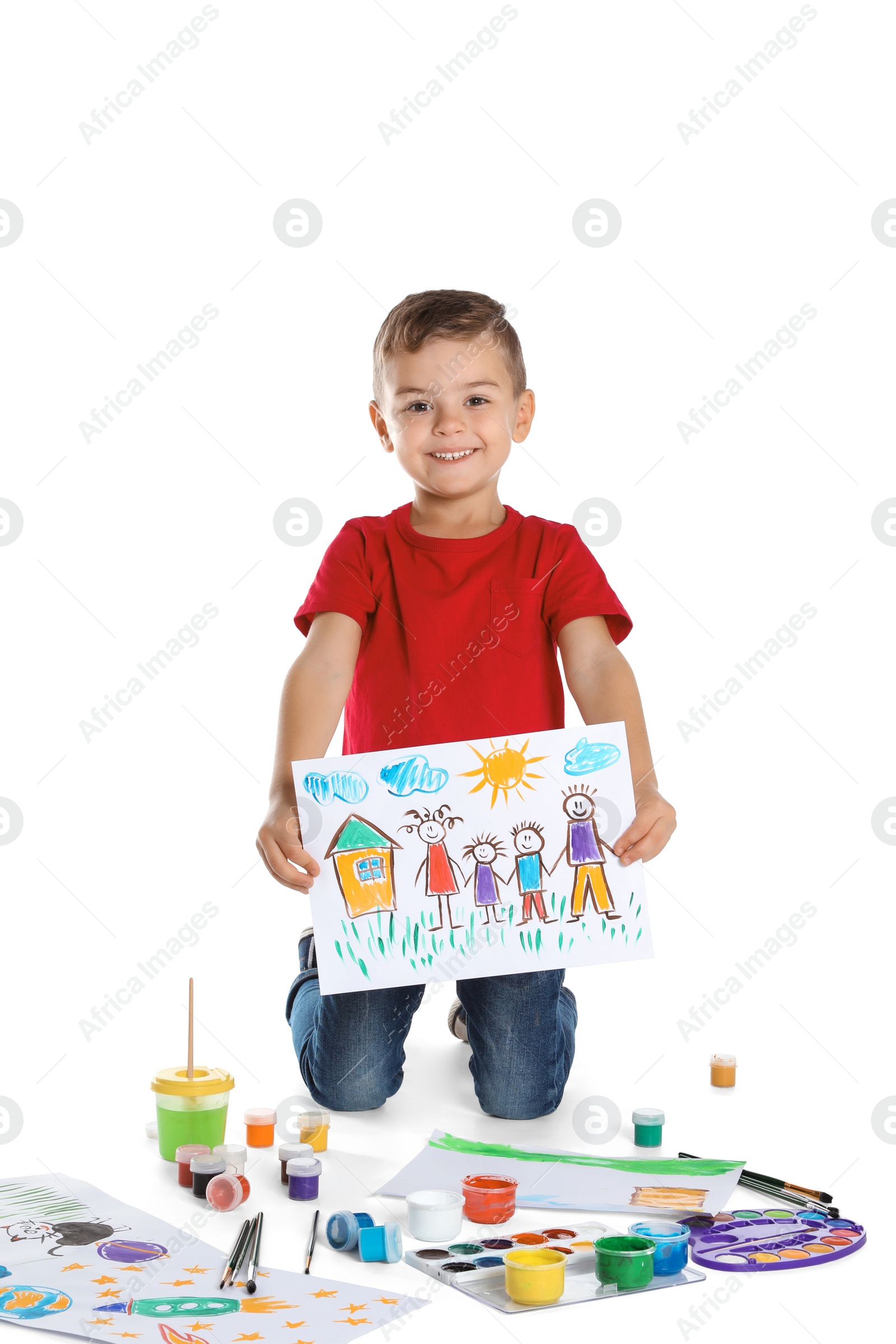 Photo of Cute child showing his painting on white background