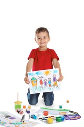 Cute child showing his painting on white background