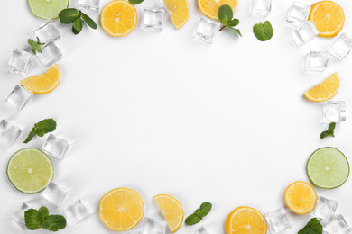 Photo of Frame made with ingredients for lemonade on white background, top view. Space for text