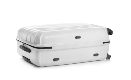 Photo of Modern suitcase for travelling on white background