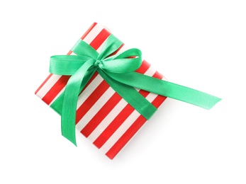 Christmas gift box decorated with green bow isolated on white, top view