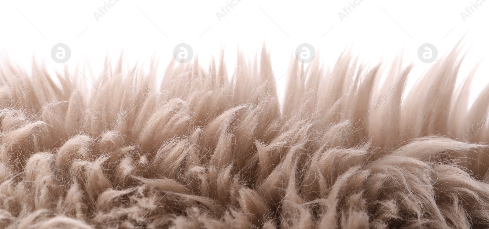 Photo of Soft beige faux fur isolated on white