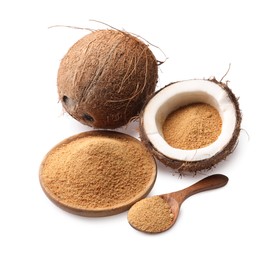 Coconut sugar in bowl, spoon and fruits isolated on white