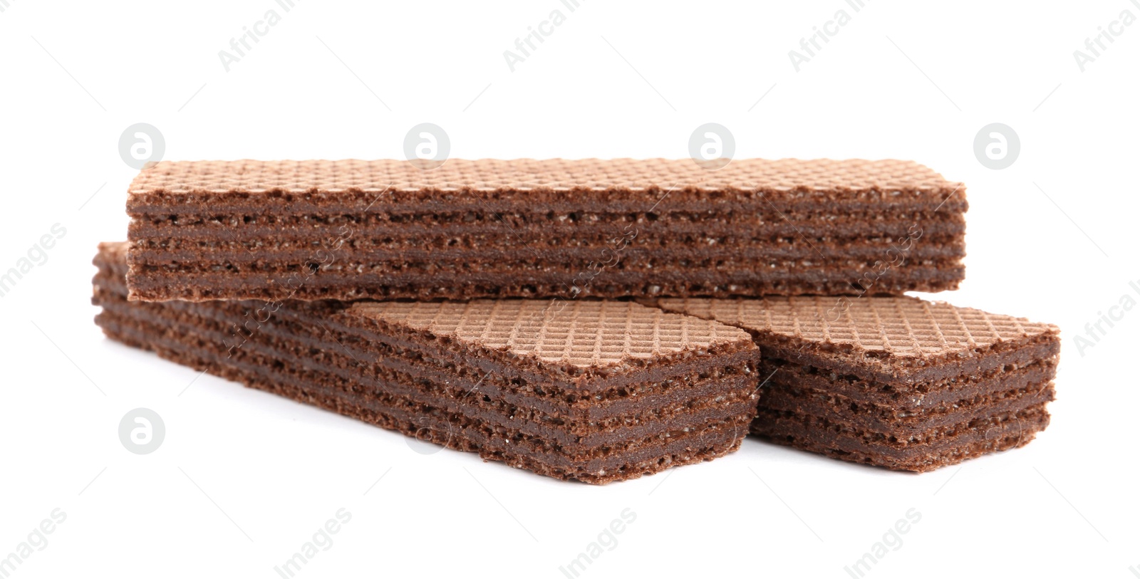 Photo of Delicious crispy wafers on white background. Sweet food