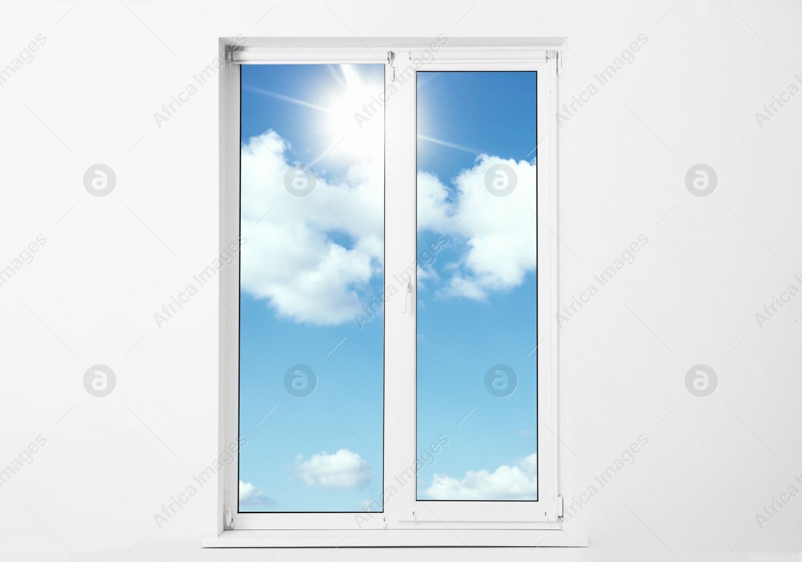 Image of Beautiful view on blue sky with clouds through window