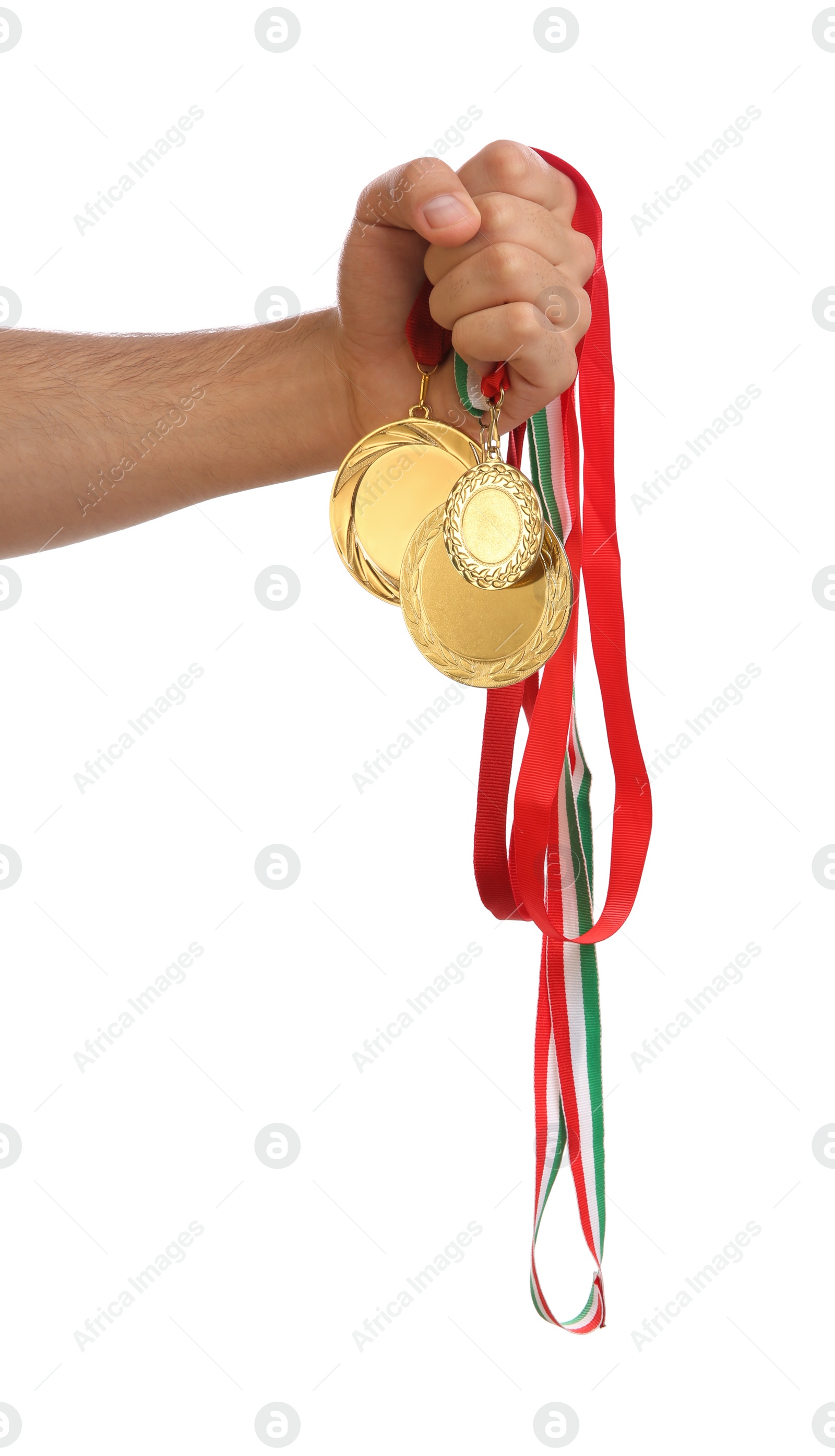 Photo of Man holding golden medals on white background, closeup. Space for design