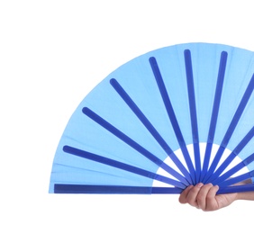 Photo of Woman holding blue hand fan on white background, closeup