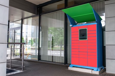 Parcel locker with many postal boxes near building outdoors