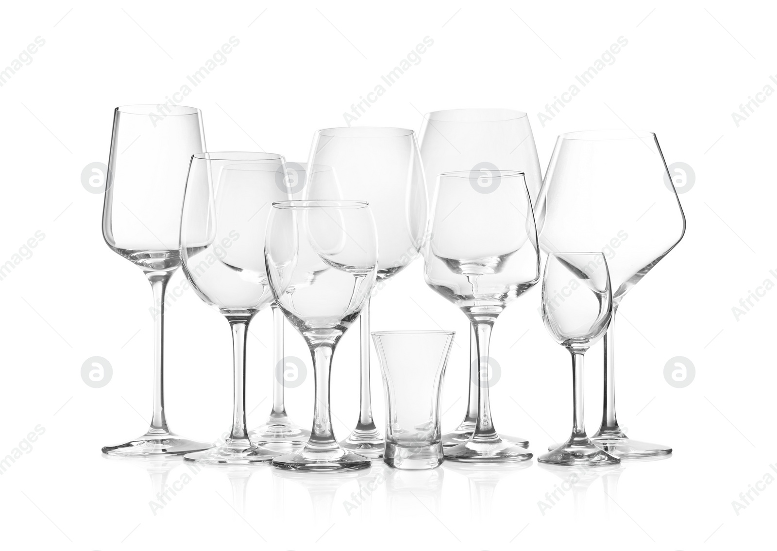 Photo of Set of new bar glassware on white background