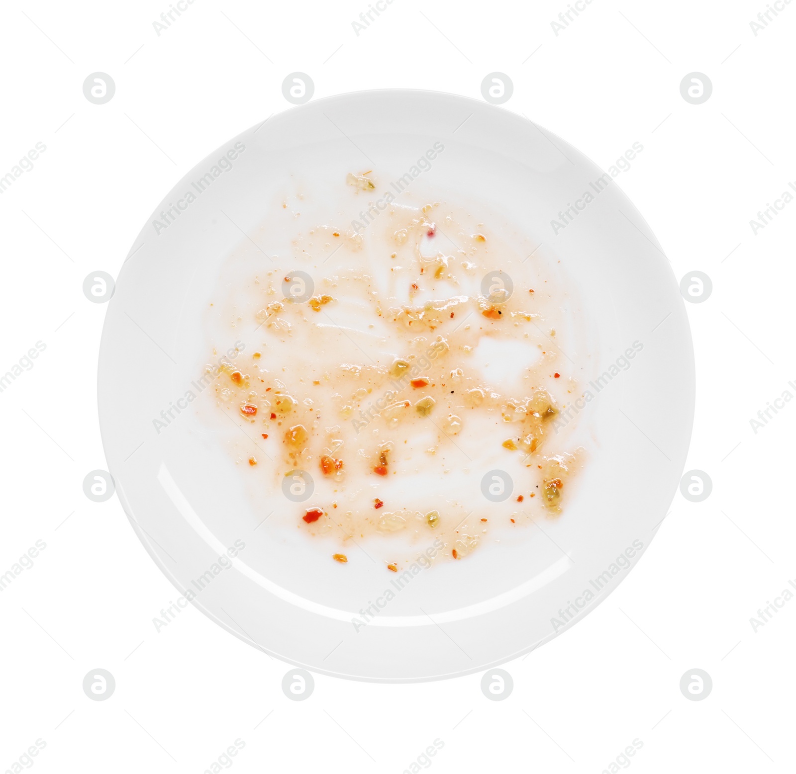 Photo of Dirty plate with smeared sauce on white background, top view