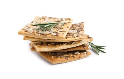 Photo of Stack of cereal crackers with flax, sunflower, sesame seeds and rosemary isolated on white