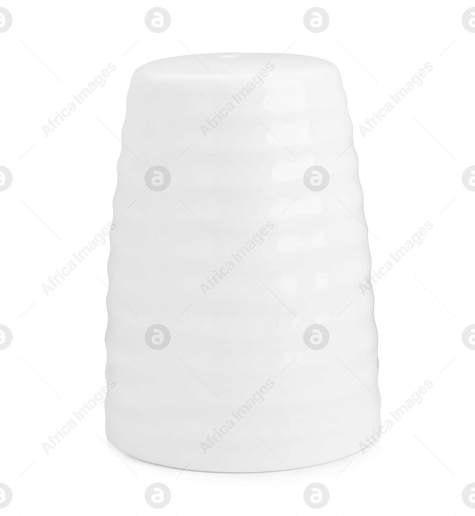 Photo of One ceramic spice shaker isolated on white