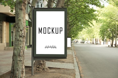 Image of Advertising board with text Mockup Ready To Use on city street