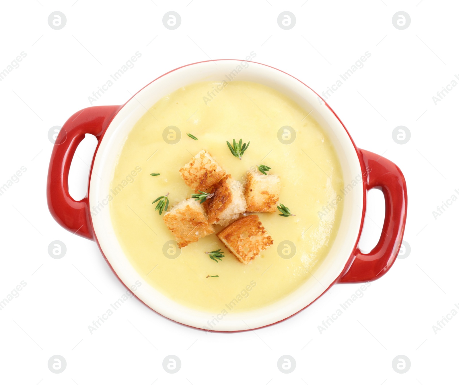 Photo of Tasty potato soup with croutons and rosemary in ceramic pot isolated on white, top view