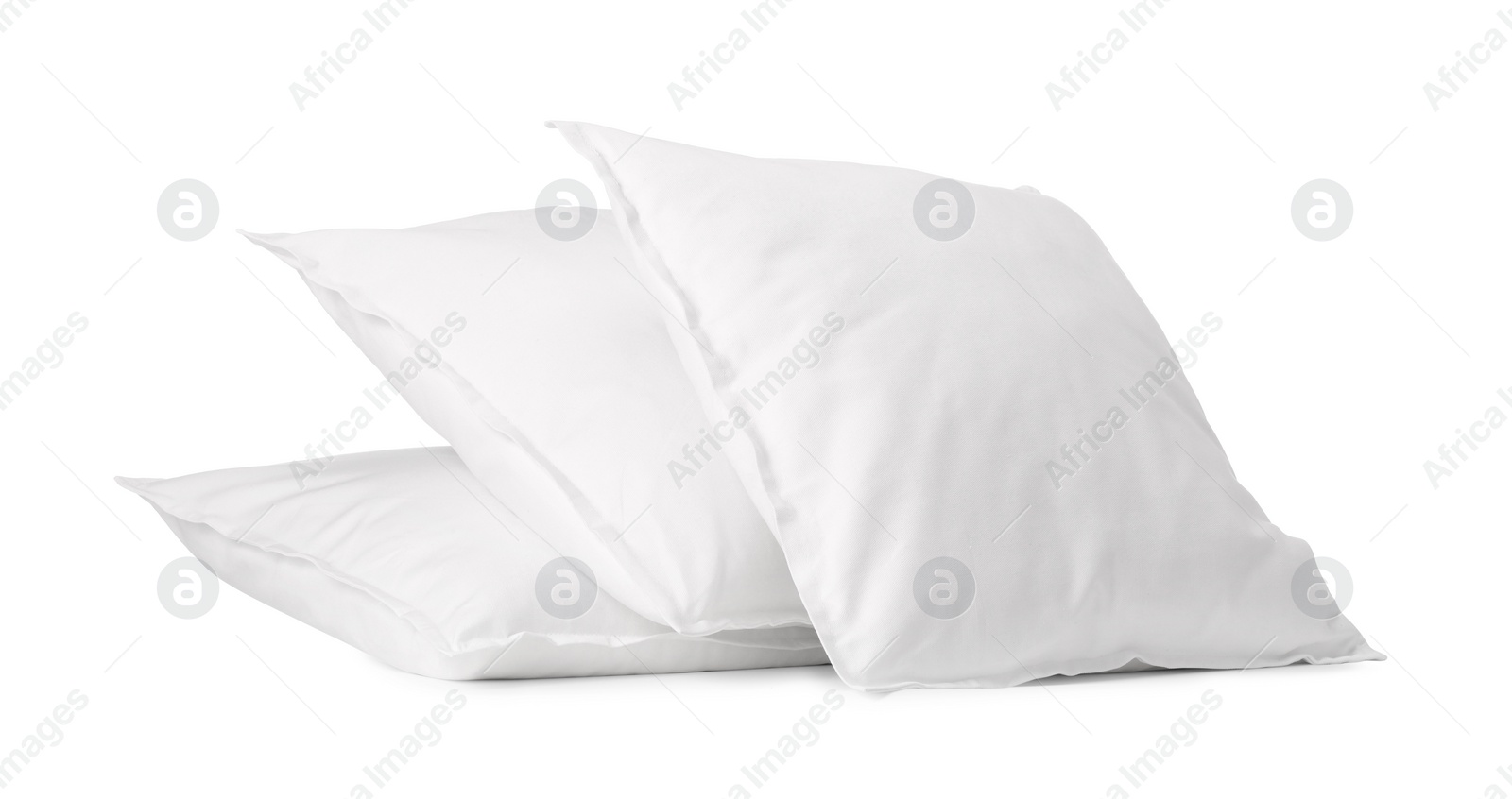 Photo of Many new soft pillows isolated on white