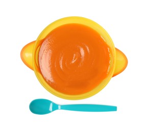 Delicious baby food in bowl and spoon isolated on white, top view