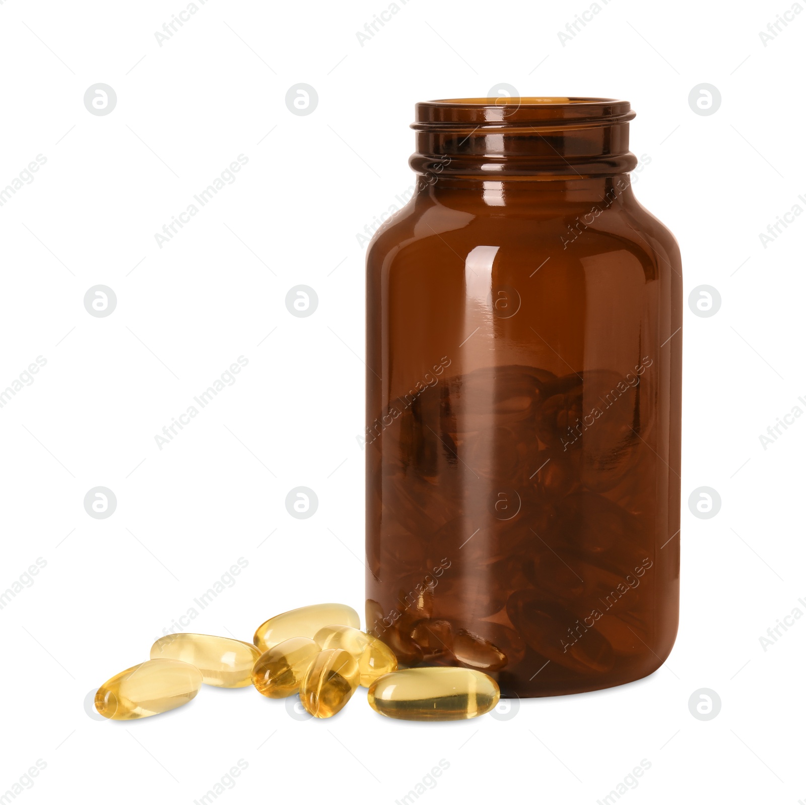 Photo of Bottle and pile of softgel capsules isolated on white