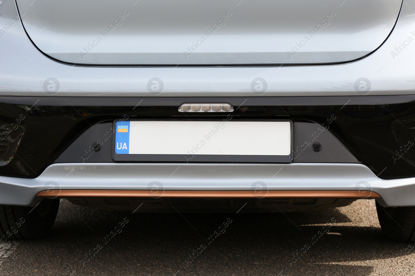 Photo of Car with vehicle registration plate outdoors, closeup