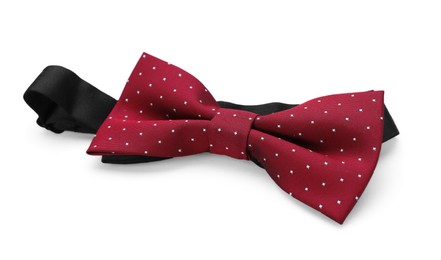 Stylish burgundy bow tie with polka dot pattern on white background