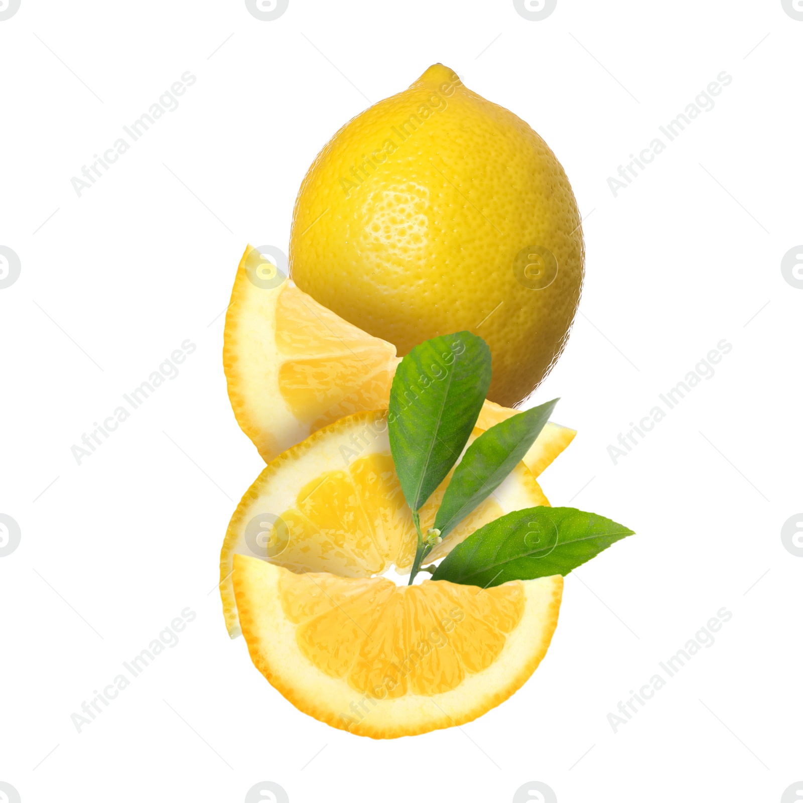 Image of Cut and whole fresh lemons with green leaves isolated on white