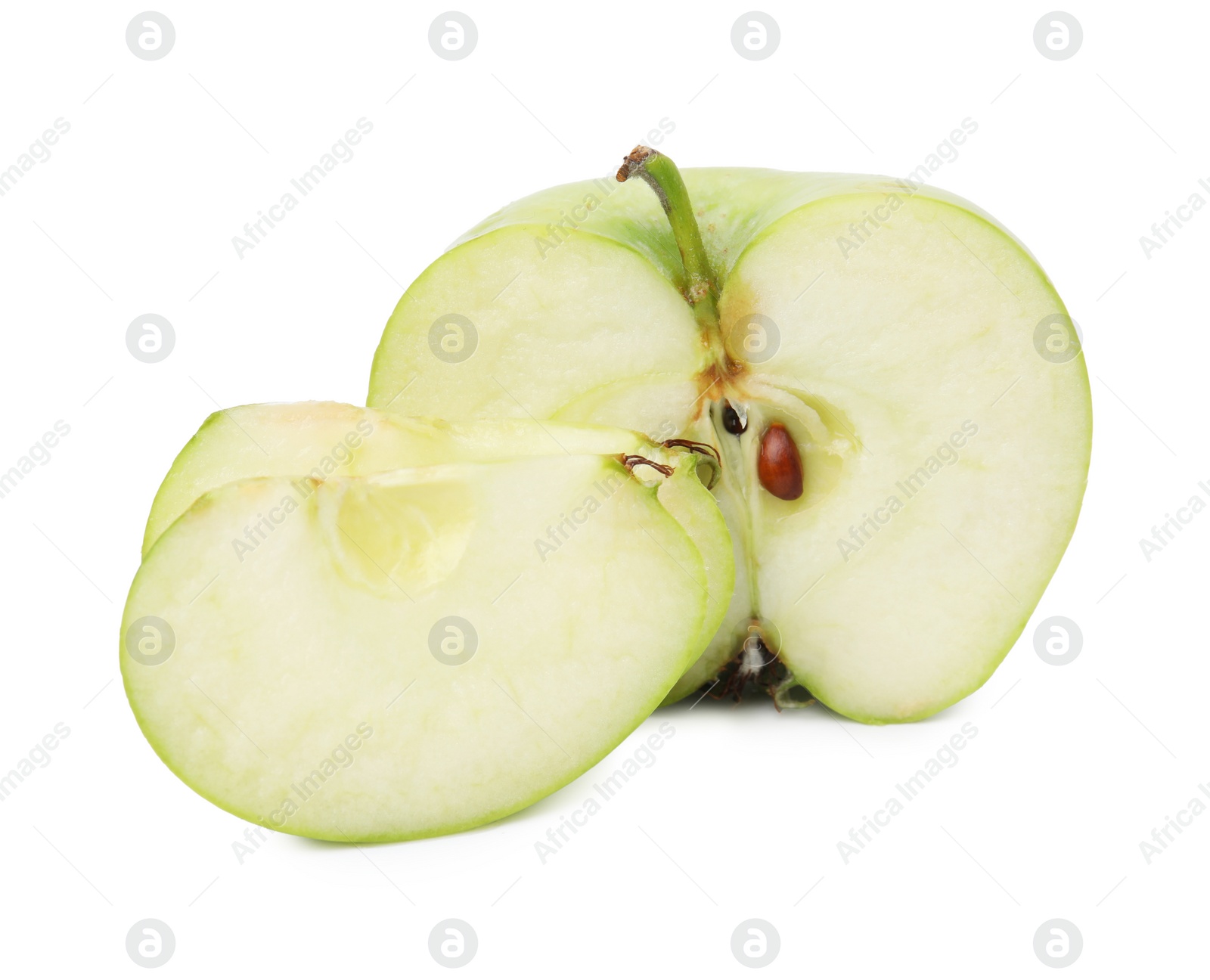 Photo of Pieces of ripe green apple isolated on white