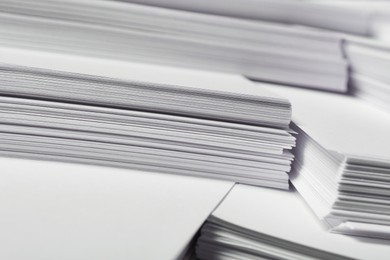 Stacks of paper sheets as background, closeup