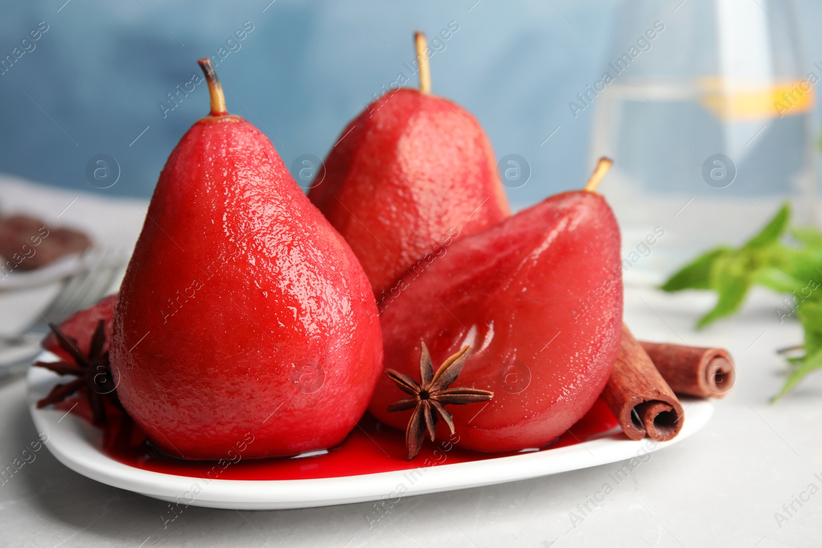 Image of Delicious mulled wine poached pears served on table