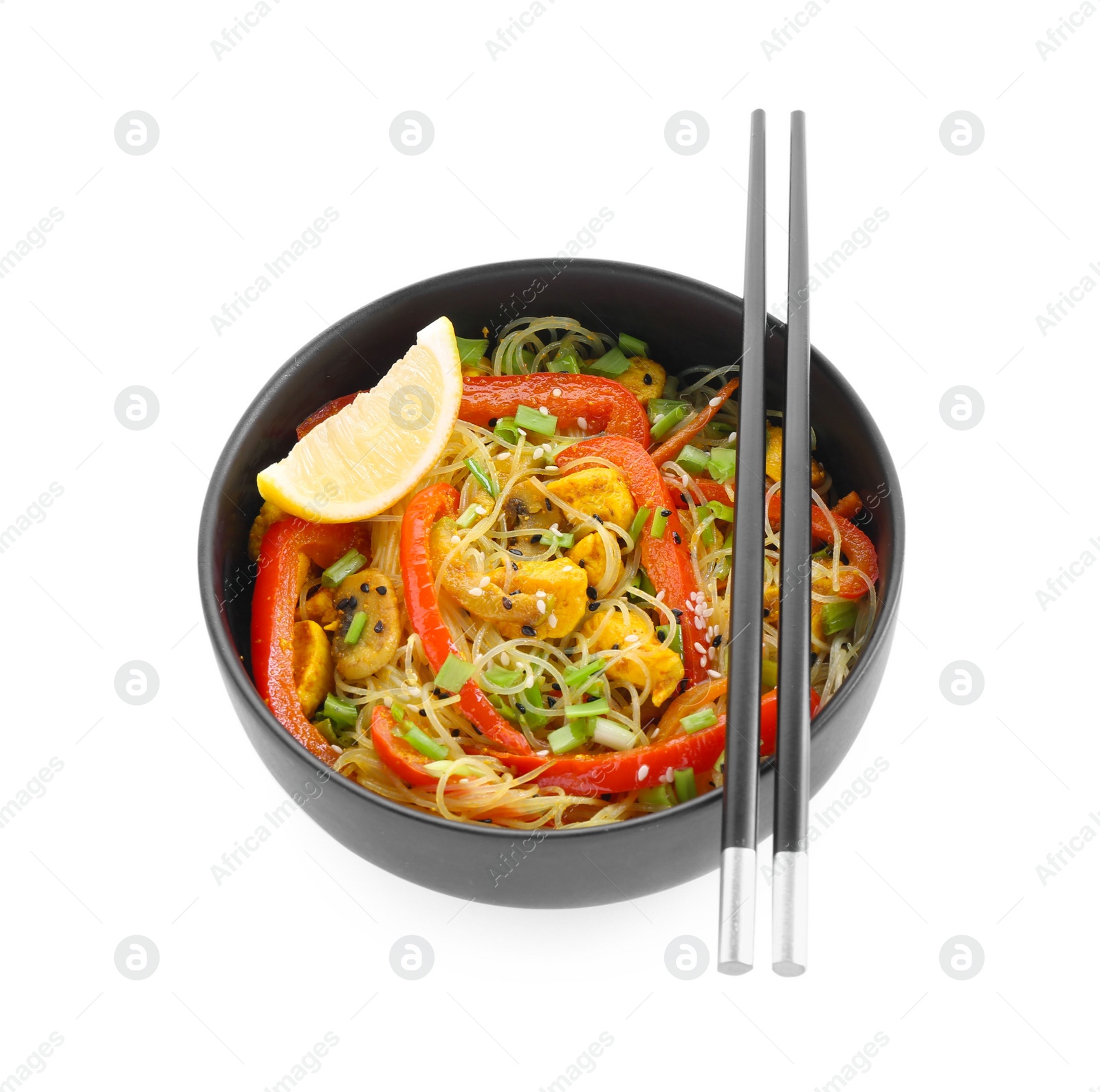 Photo of Stir-fry. Delicious cooked noodles with chicken and vegetables in bowl isolated on white, top view