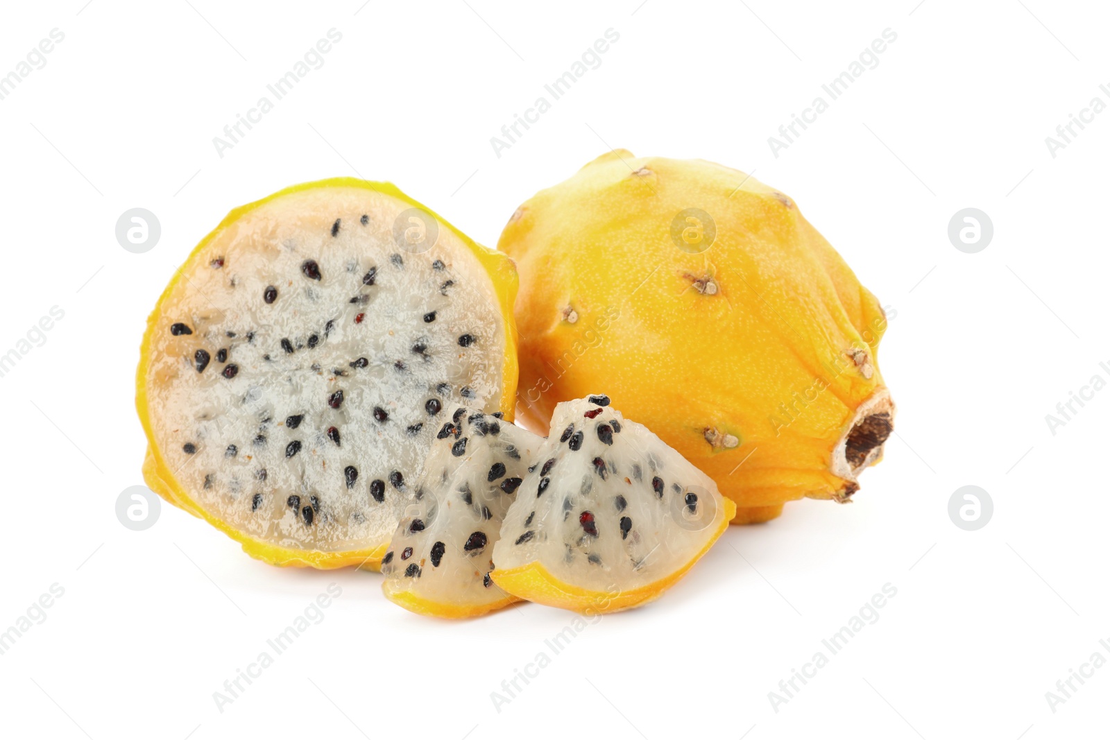 Photo of Delicious cut and whole yellow pitahaya fruits on white background