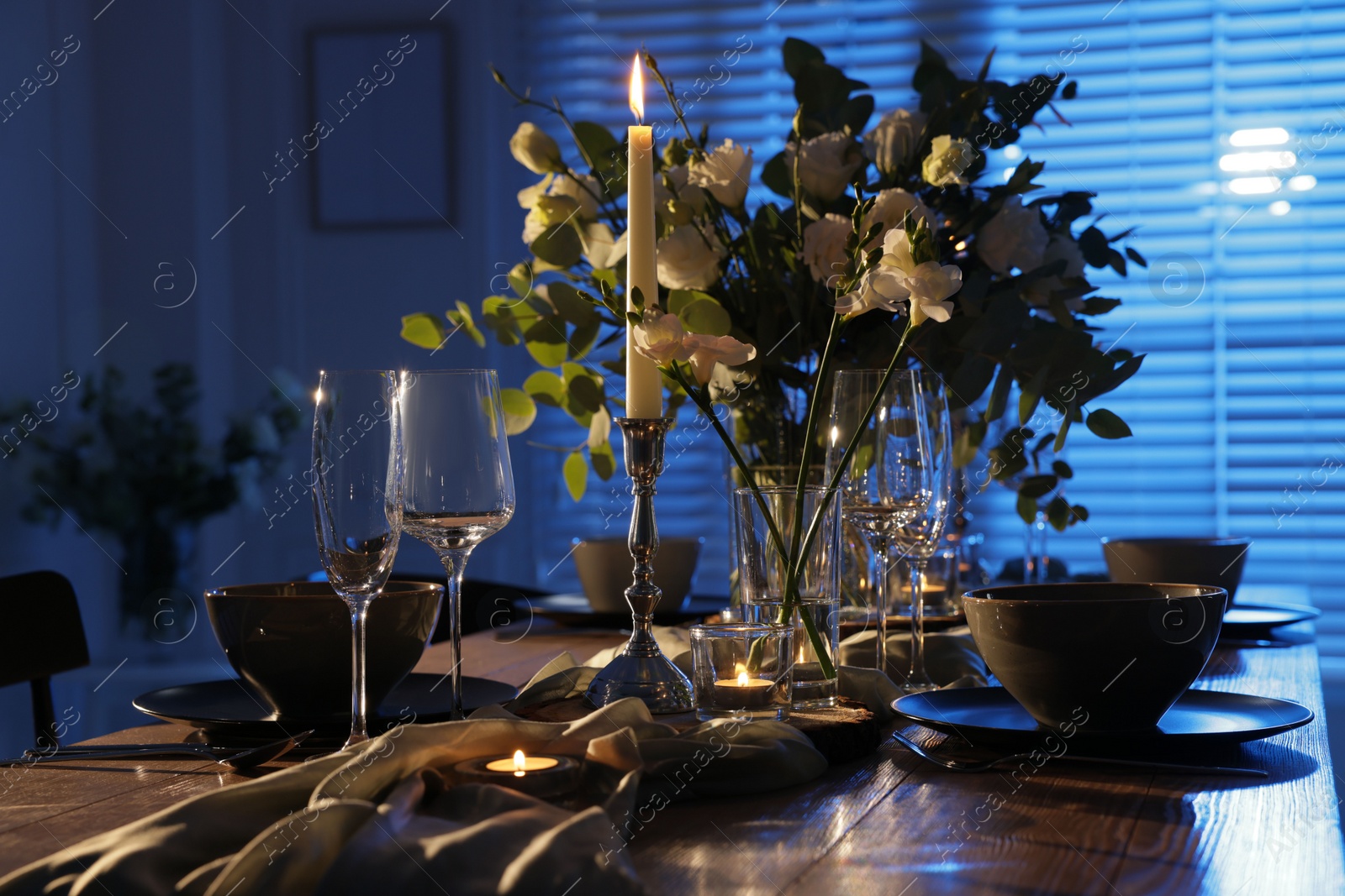 Photo of Festive table setting with beautiful tableware and decor indoors