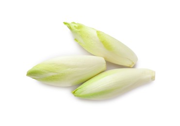 Photo of Raw ripe chicories on white background, top view