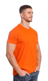 Photo of Man wearing orange t-shirt on white background. Mockup for design