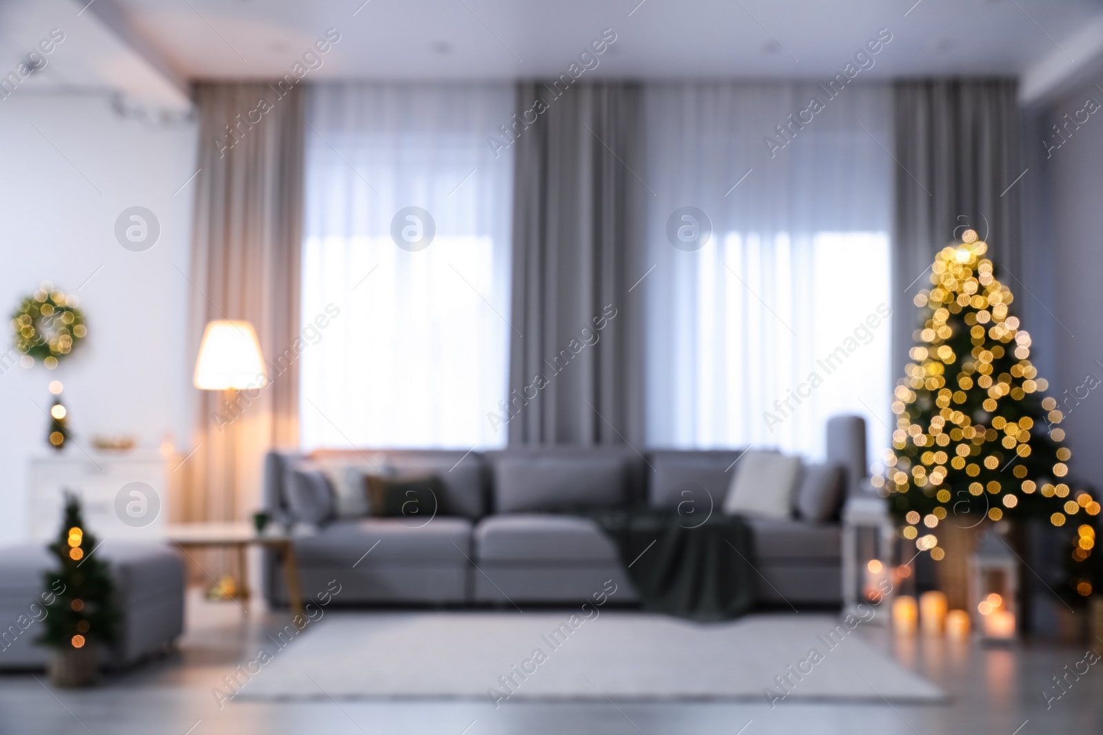 Photo of Blurred view of elegant living room interior with Christmas decor