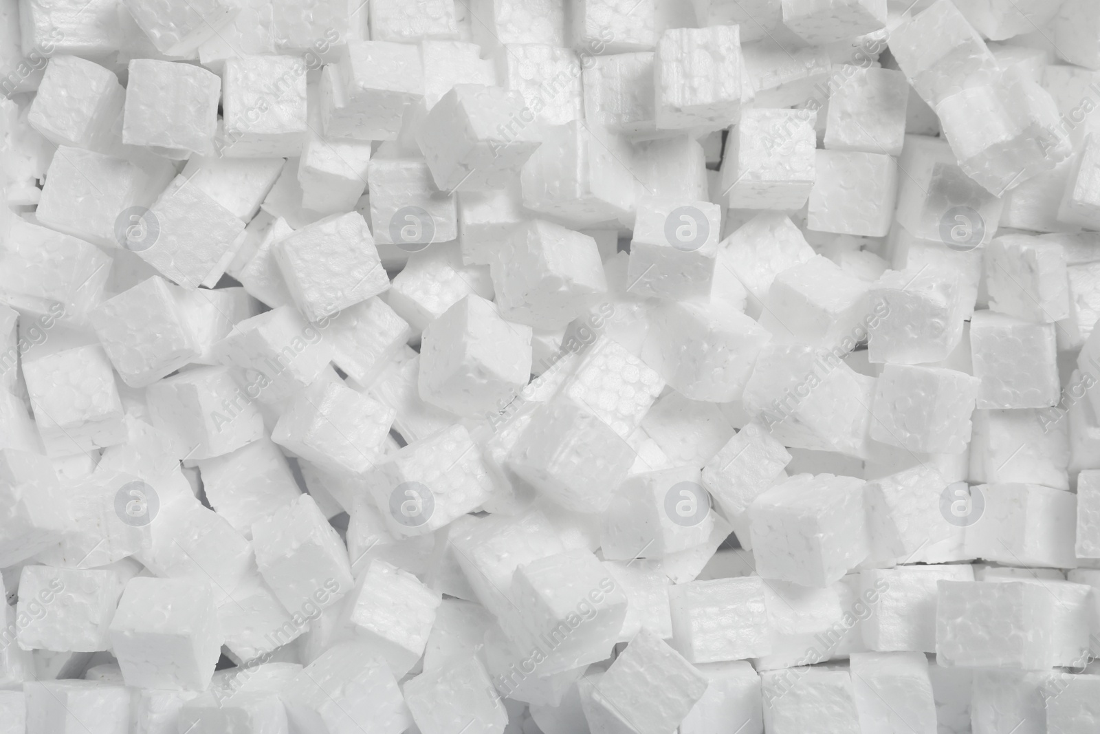 Photo of Pile of styrofoam cubes as background, closeup