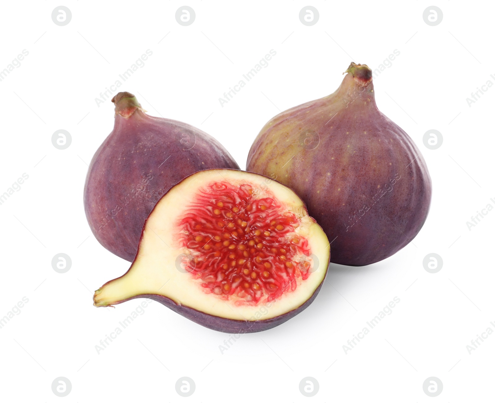 Photo of Whole and cut tasty fresh figs isolated on white